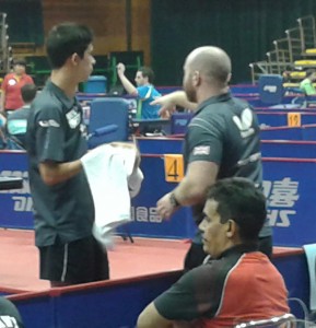 Coach Matt calls a time out in Kim's singles 