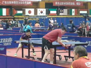 Aaron wins the first singles on his eighth match point