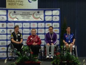 Medal presentation for the women's class 4-5 singles in which Megan Shackleton took gold